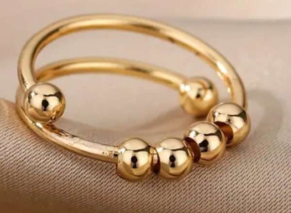 Bague perle tournante