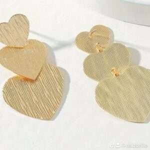 Boucle d'oreilles triple coeur strié